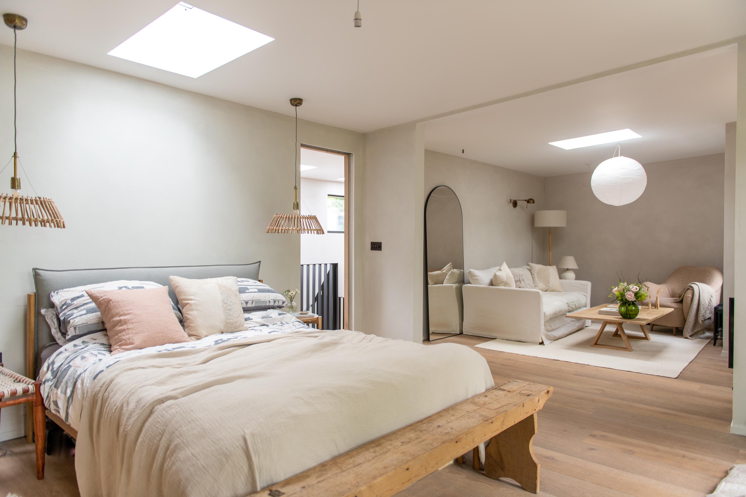 Room with bed and two rooflights 