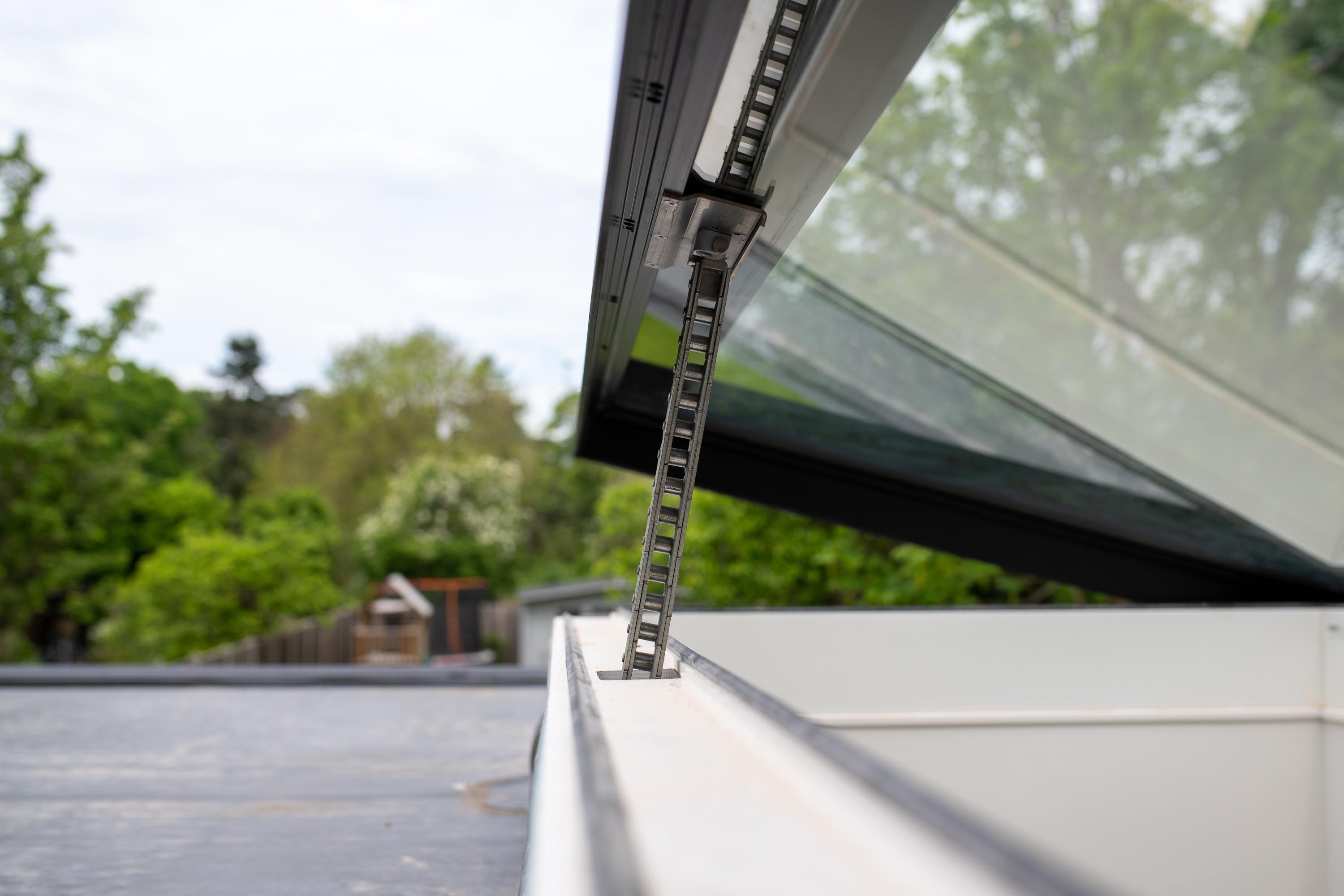 Opening rooflight close up external image of chain 