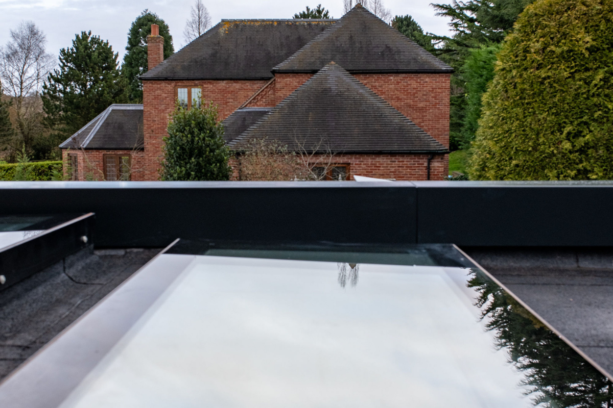 Vario by VELUX bespoke rooflights blue kitchen